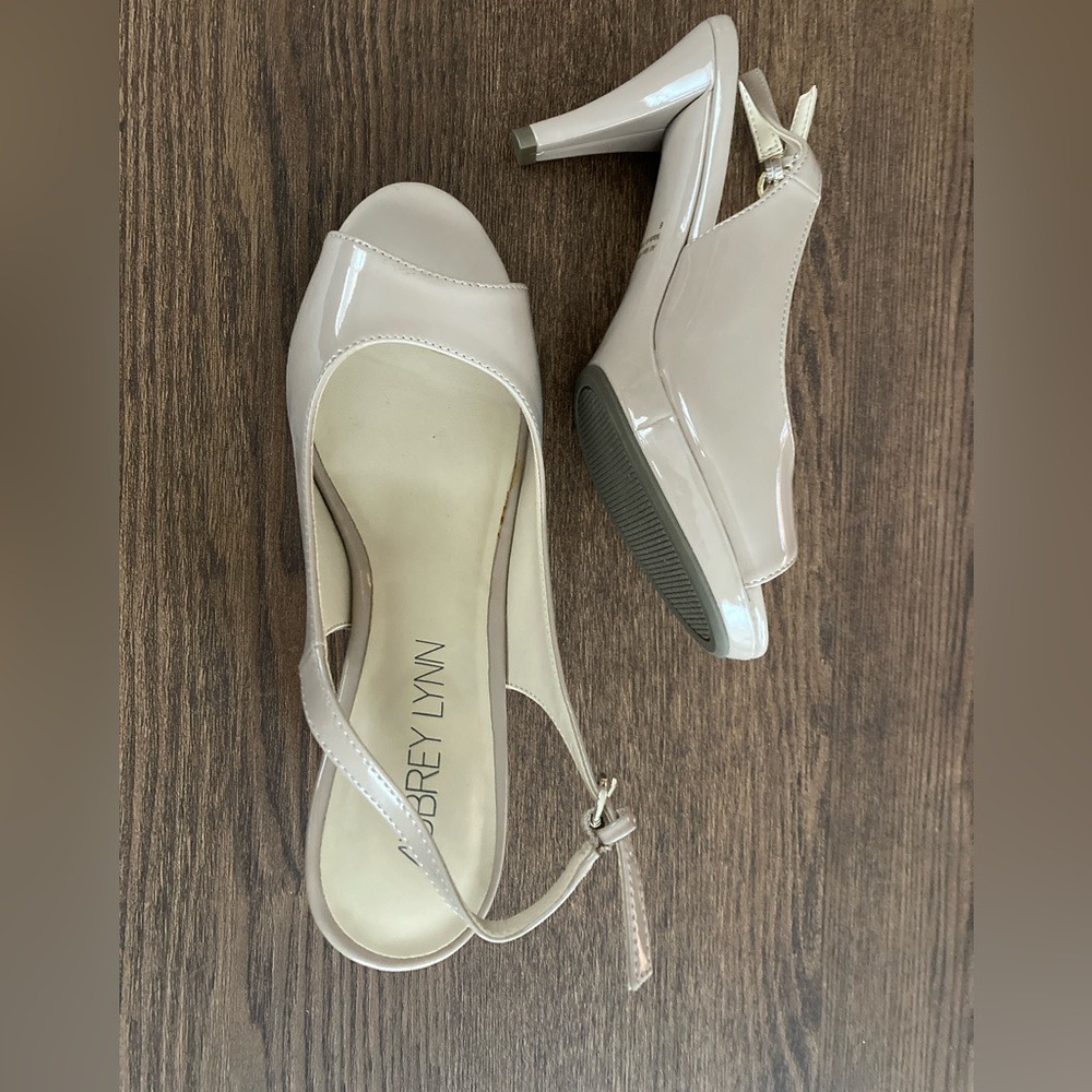 Size 6. Nude. Sling backs. Never worn.